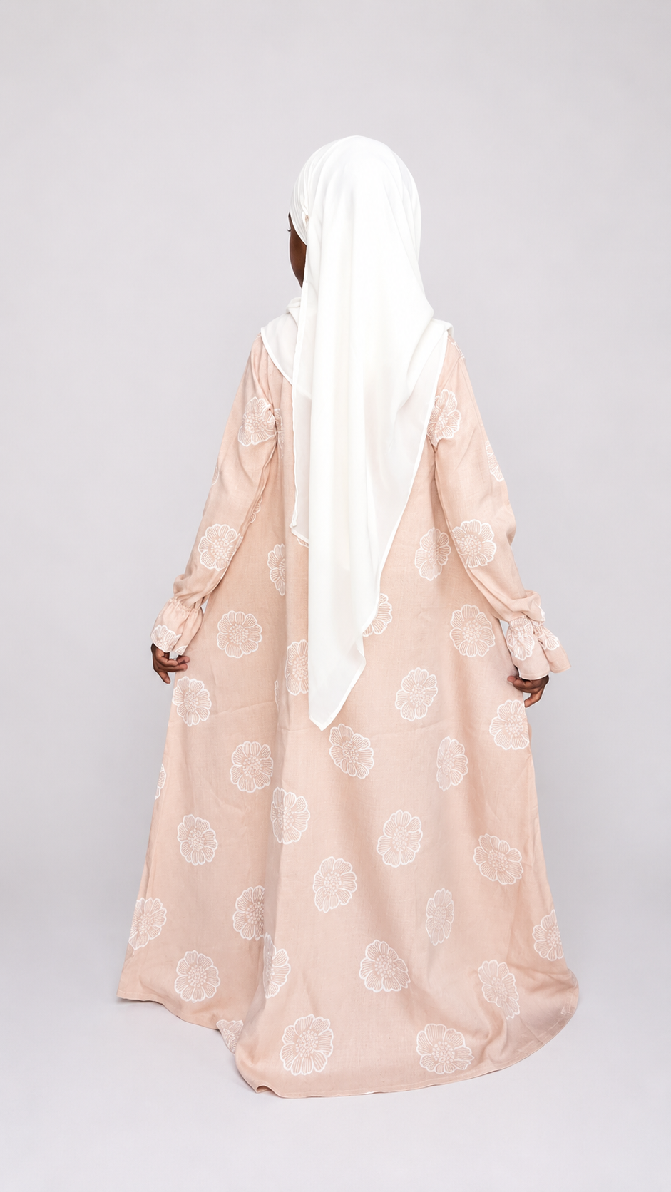 Abaya Soleil : élégance et douceur pour les petites filles.