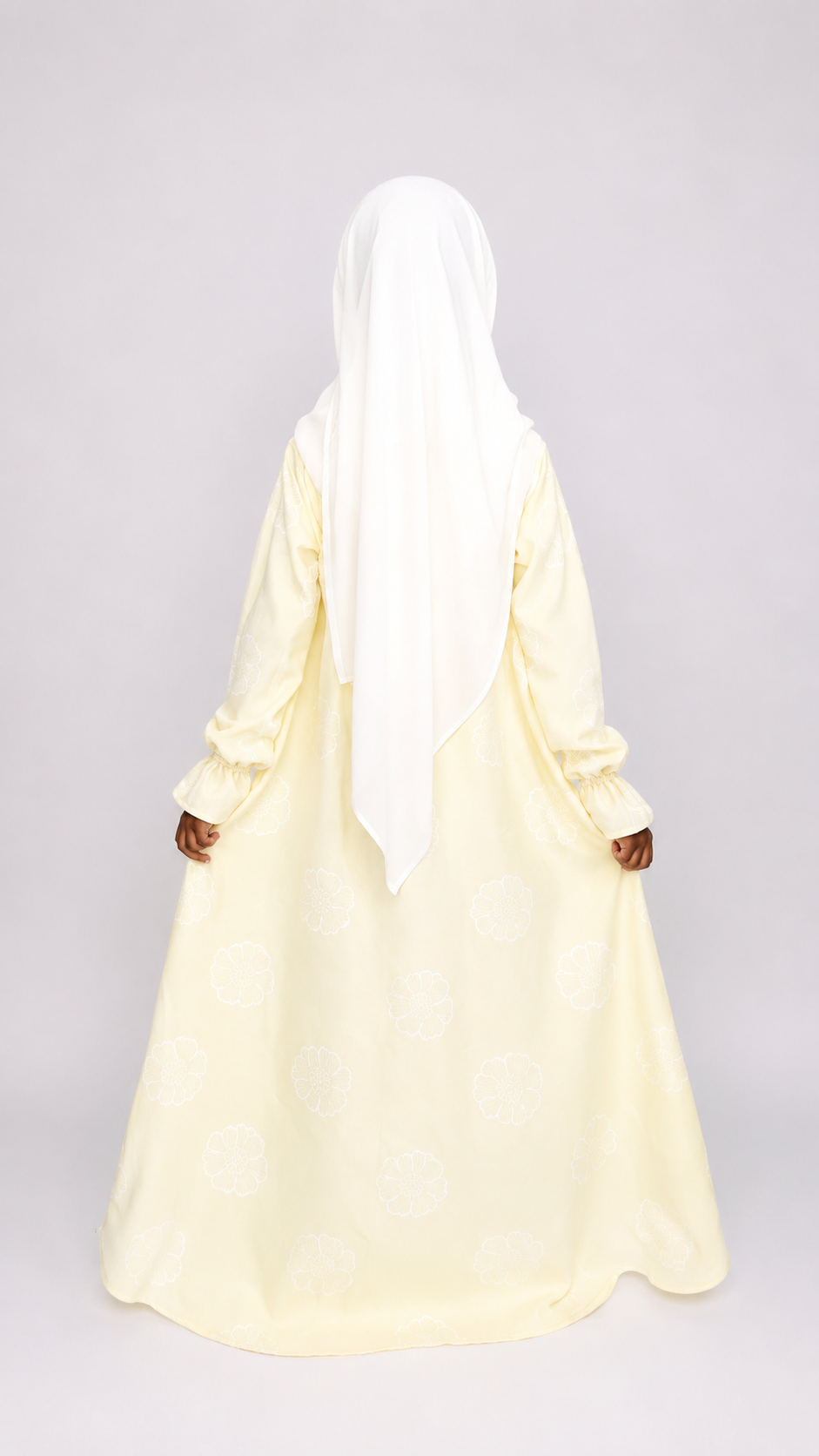 Abaya Soleil : élégance et douceur pour les petites filles.